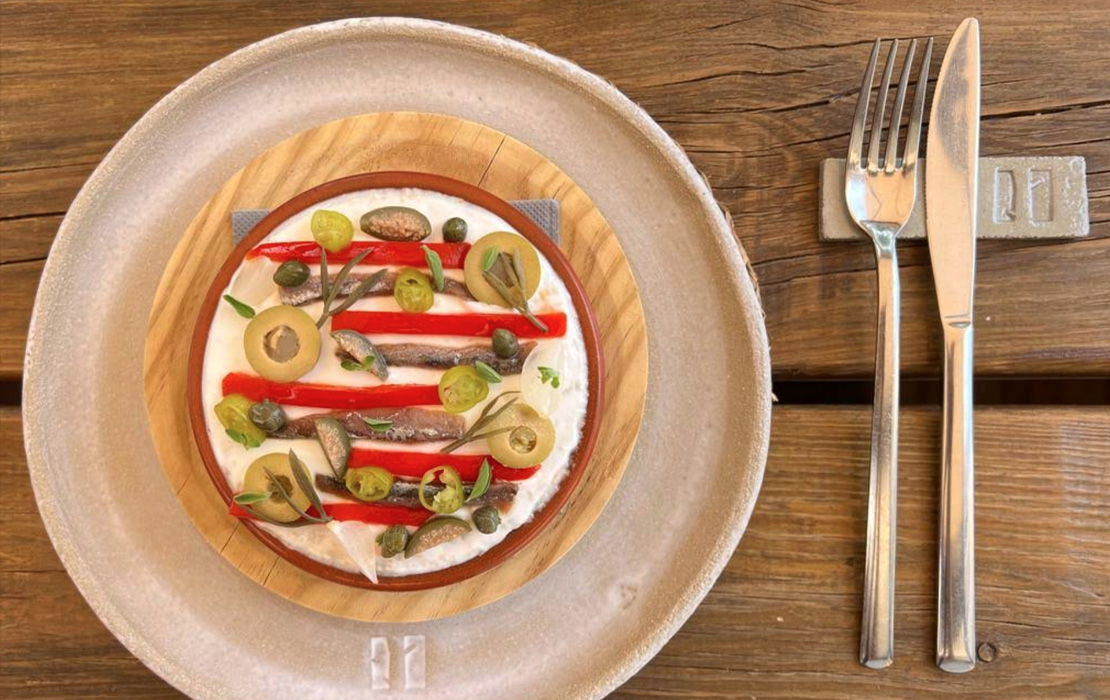 Savor the essence of seasonal Mallorcan cuisine at Joan Marc Restaurant, a recommended stop by Sailme Charter.